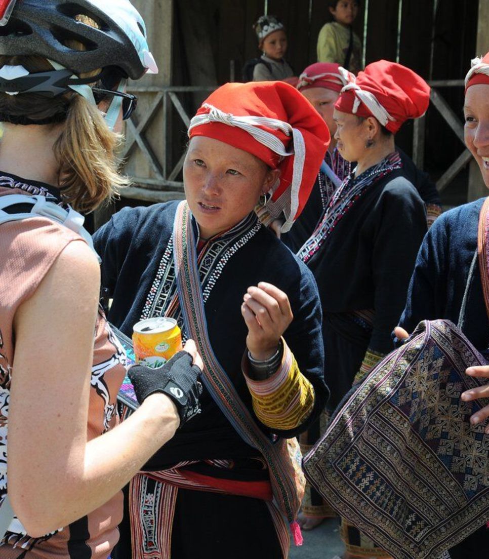 Throughout the tour, you'll meet the friendly hill people, dressed in distinct colorful and traditional clothing specific to their tribe