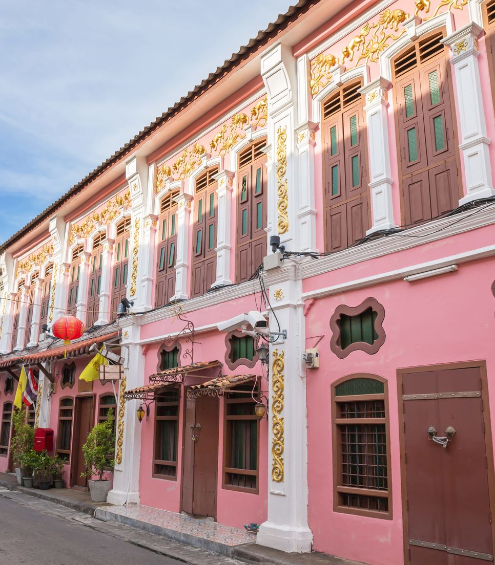 Explore the beautiful buildings of Sino-Portuguese origin in the town that are both colorful in their past lives and in appearance