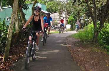Cyclists on a narrow path