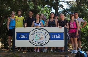 Group by 'Rail Trail' sign