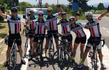 Group of cyclists posing together