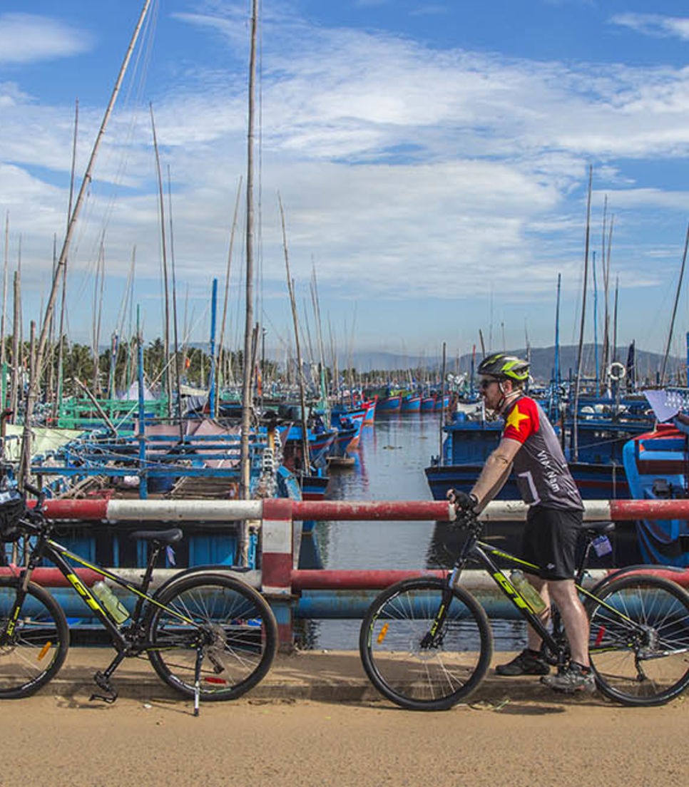 Visit fishing villages and hop on a boat to the port town of Hoi An
