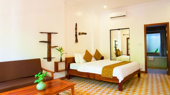 In a quiet part of town with lush tropical gardens, spacious and comfortable rooms, a fantastic pool and friendly ambience