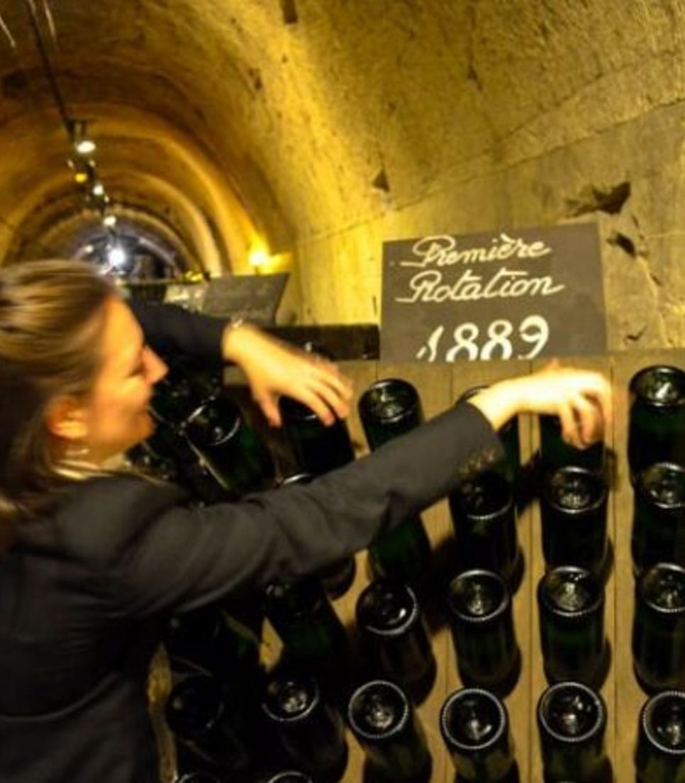 Visit champagne houses and tour the underground cellars