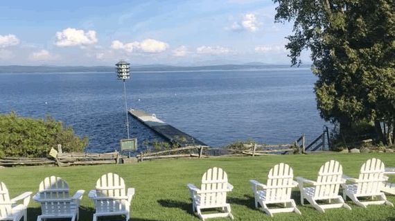 Nestled in a quiet setting overlooking Lake Champlain, this lovely property features its own dock, tennis courts, and restaurant
