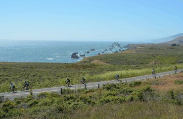 Cyclists riding  a coastal road