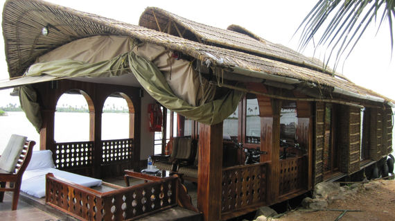 Relax and cruise in a houseboat - a converted rice barge kitted out for a comfortable stay