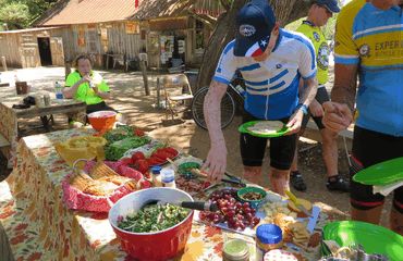 Cyclists tucking into outdoors buffet