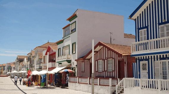 Arrive in this picturesque village on day 3 with the unique multi-coloured striped houses