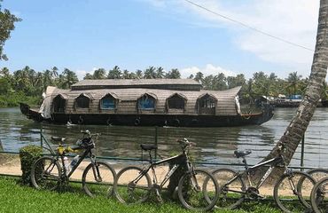 Houseboat with bikes on the shore