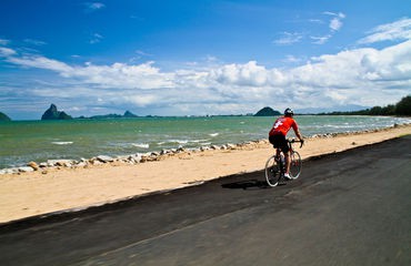 Cyclist on coastal road