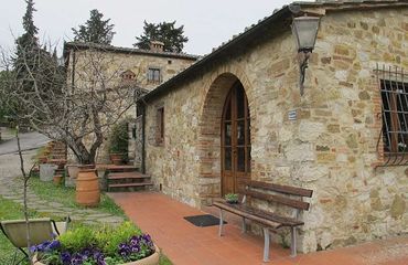 Stone building with seats outside