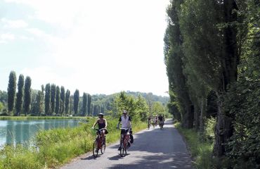 Cycling on path next to water