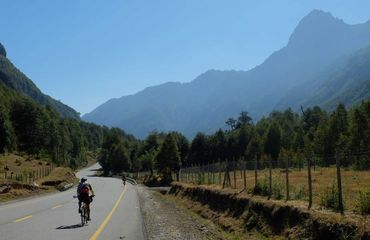 Cyclist riding mountain road