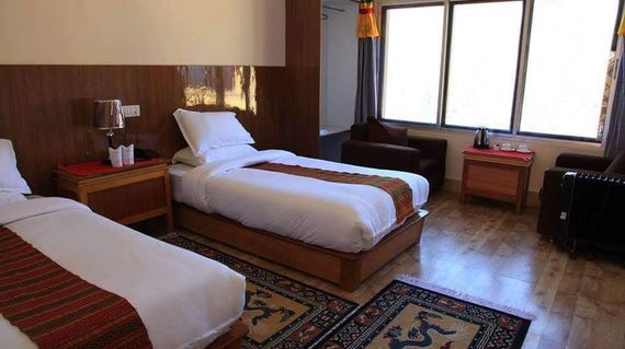 Unwind after a day of riding in a mix of modern comforts and elegant Bhutanese art