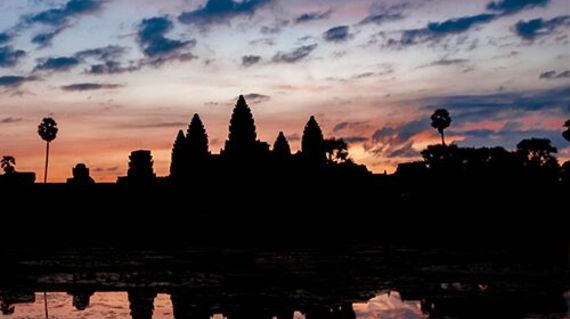 Go on a sunrise cycle to discover the ancient temples at Angkor