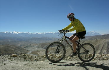 Cyclist with mountain background