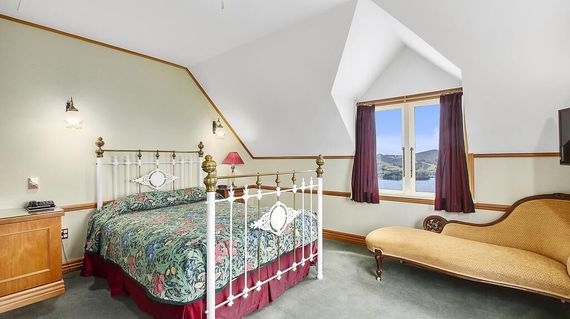 Built within the grounds of Larnach Castle. Fantastic views over the harbor and Otago Peninsula