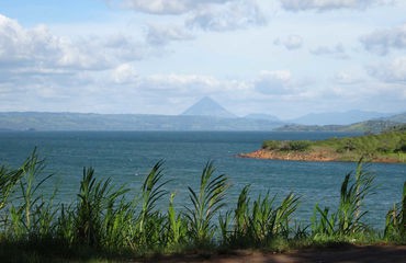 Lake with volcano in background