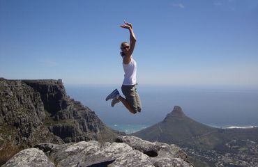 Jumping in the air on mountain