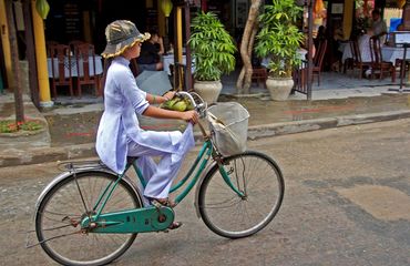 Vietnamese lady cycling