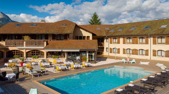 Ease your muscles with a dip in the hotel's outdoor pool or hot tub