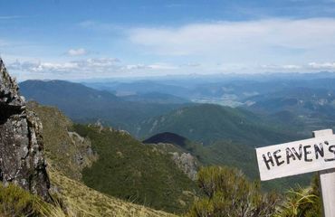 View over mountainous landscape with sign