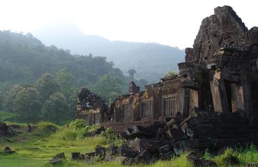 Historic building in misty mountains