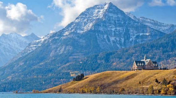 Epic scenery of Upper Waterton Lake and the surrounding mountains at this luxury hotel where you'll spend several nights