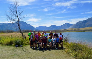 Group infront of water and mountains
