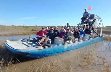 People in an airboat