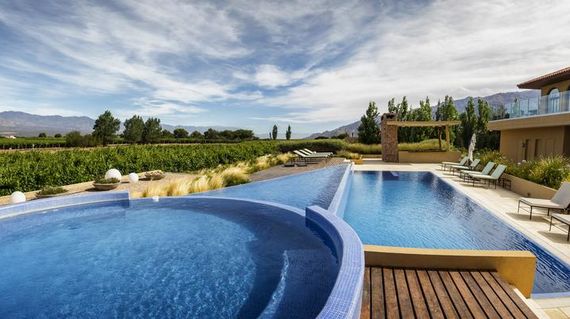 Relish in the luxe surroundings of this boutique hotel located amidst vineyards and the Andes mountains.