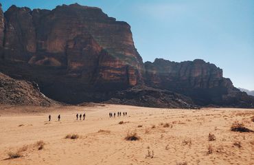 People walking in Wadi Rum Desert