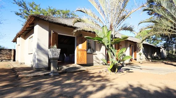 Delight in the charming African atmosphere and gorgeous natural landscape of this property.
