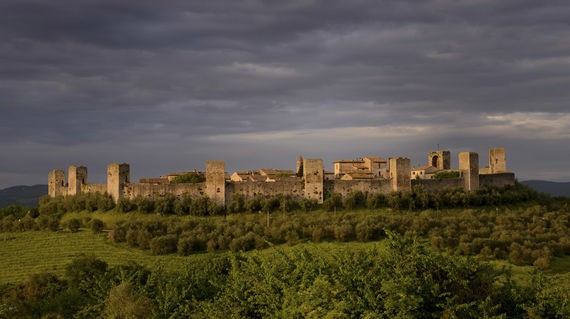 The tour begins in this walled town in Siena province