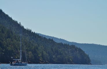 Sailboat by an island