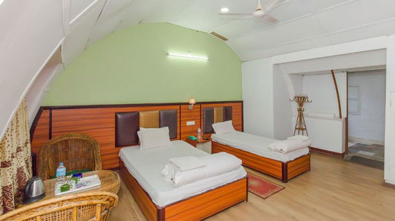 Acres of greenery provide a peaceful ambience and restful sleep in its spacious rooms