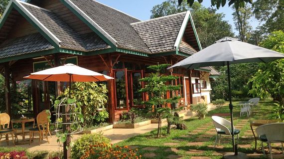Unwind in lush gardens and rustic guestrooms at the heart of Bolaven Plateau.